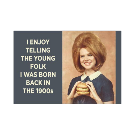 2" x 3" rectangular magnet with image of woman holding a double cheeseburger that reads "I enjoy telling the young folk I was born back in the 1900s."