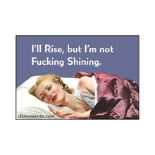  2" x 3" rectangular magnet with woman in bed that reads "I'll Rise, but I'm not F*cking Shining."